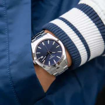 Tissot Gentleman T1274101104100 ur til Herre med Blå urskive på 40 mm i diameter og Lænke urrem i Stål