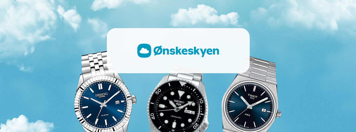 Desktop banner af tre ure på en blå himmel baggrund